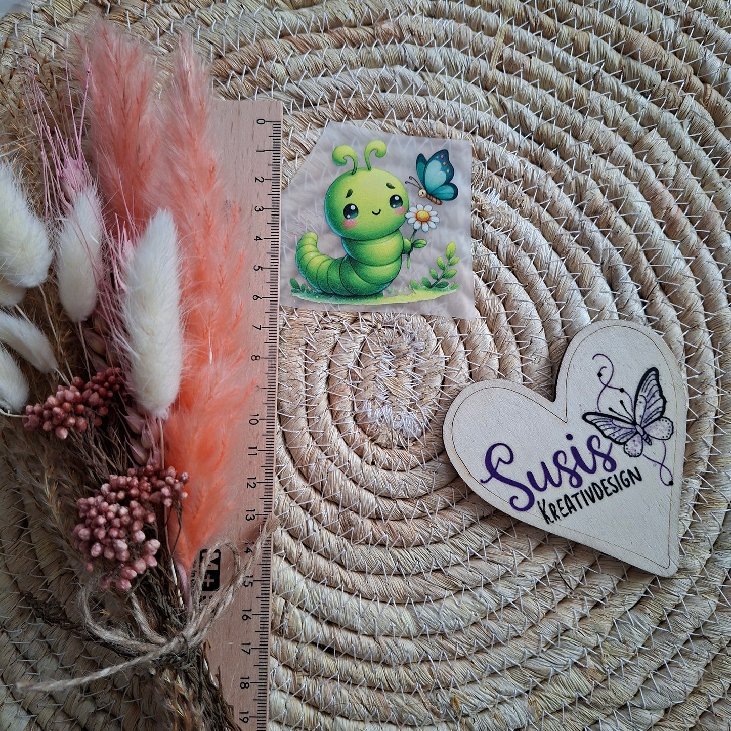 Bügelbild, Raupe mit Schmetterling